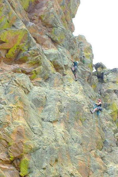 Jim Thomson, leading "Horny Lizards." Belayer, Sharon Legg.<br>