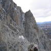 The 3rd belay, on top of the first tower.  Enclosure couloir in the background.