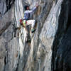 Kurt Smith climbing at Mayhem Cove.<br>
Photo by Blitzo.