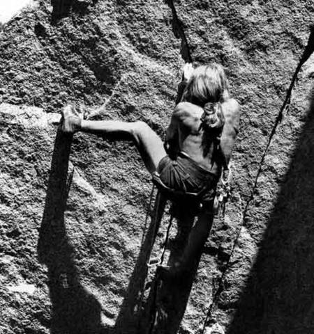 Rick Cashner at the crux, on the first free ascent of "Space Walk" 5.11c. 1979.<br>
Photo by Blitzo.