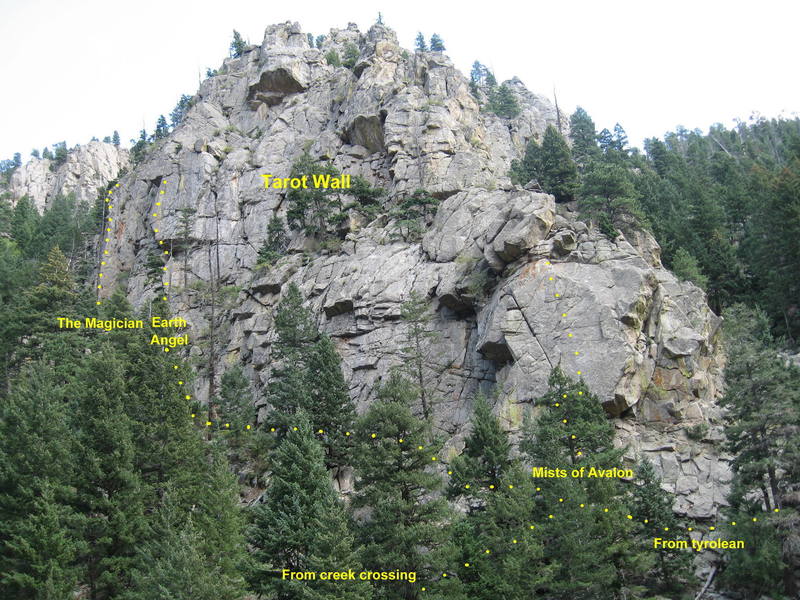 Easiest approach to The Magician. Go the the First Tier by the route Mists of Avalon. Follow a path left and up to Tarot Wall just left of the route Earth Angel. Go left about 50' to the arete on the left side of the wall.