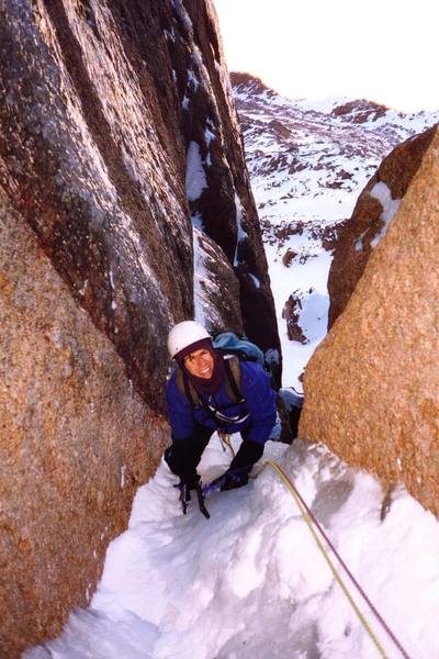 Emerging through the first hole on Blind Assumption, Pikes Peak.