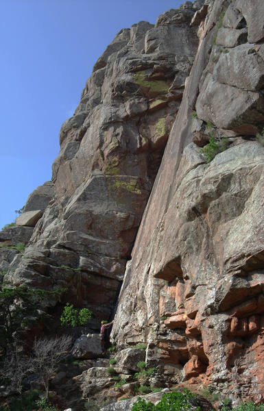Looking across the main face. The most notable line is the Dihedral which climbs up to the roof and out onto the face.