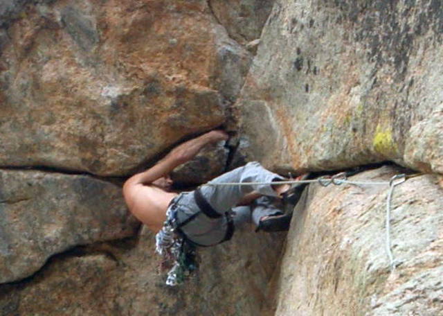 Tony Bubb leading Marlin Alley (11b) on Batman Rock, at Lumpy Ridge, CO.