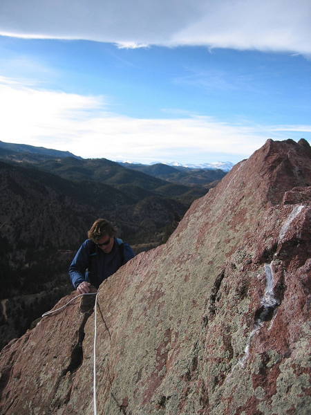 Chris Carithers topping out on a fine November day, 11/22/02.