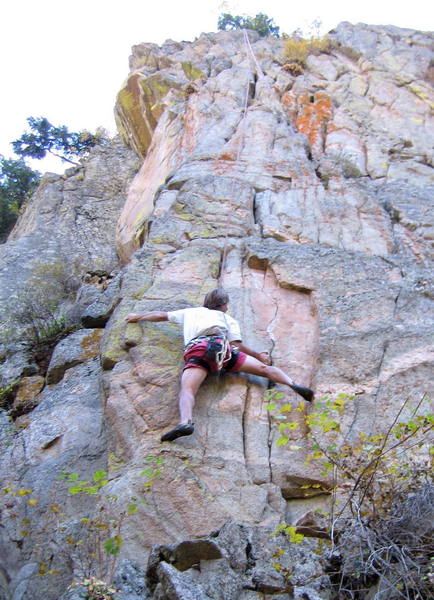 Peter Dillon at the crux of the 5.10 start.