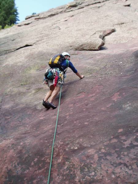 Me on the first super run out pitch on the First Flatiron Direct route.