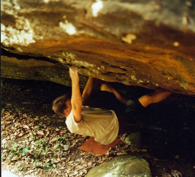 This is me on an unfinished project at an area called the Heights. I've been tentatively calling it Mr. Smartypants an it is probably V5-6. It's unlikely that this will ever get climbed because of access issues.