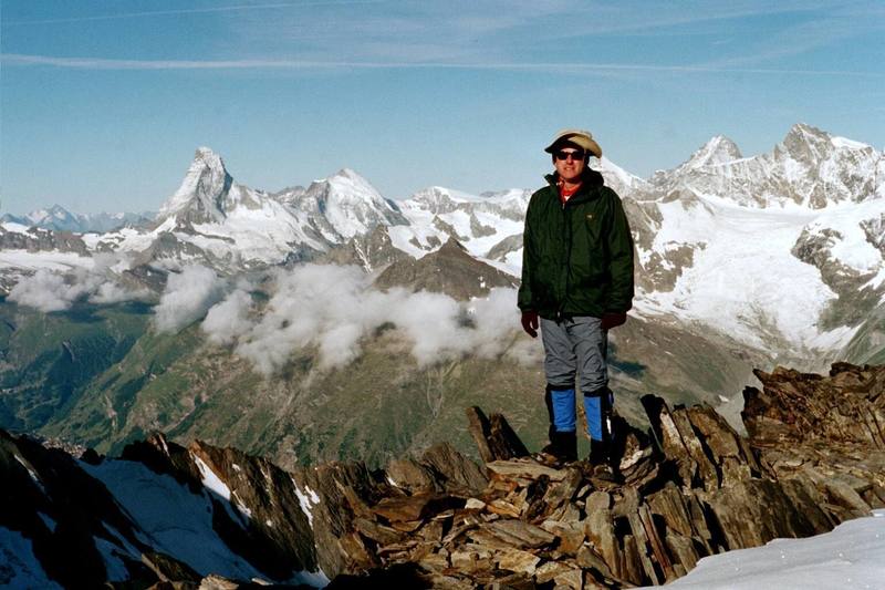 On the ridgeline of the Festigrat on the Dom in Switzerland on 5 Jul 03. Matterhorn on the skyline to the left.
