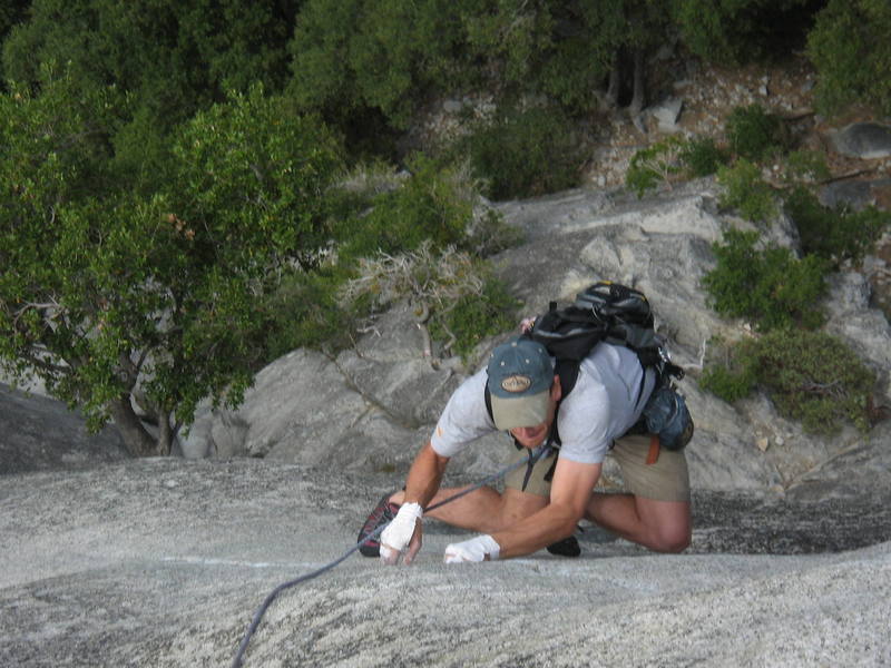 Kirk Hansen midway through the fingery crux pitch of Serenity Crack.