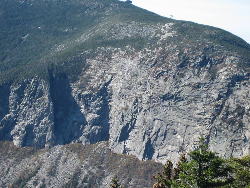 Cannon Cliff from Mount Lafayette. The stark Whitney Gilman Ridge can be seen on the left side.
