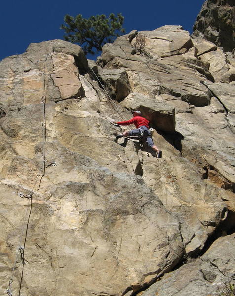 Greg Hand stemming up at the crux.