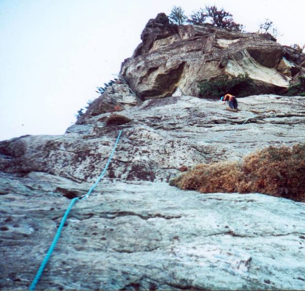 Looking up from the belay at pitch 2 of the Prow. Dave Lutes is leading.
