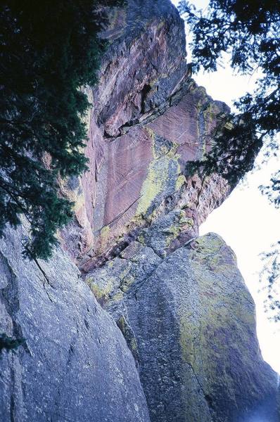 Euclid's Corner climbs the thin left-facing dihedral to the wide, right-leaning roof pictured in this shot. The crux is 2/3 up the thin corner. Photo by T. Bubb, 09/06.