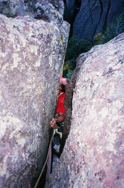 Chris Parks Uses technique #1 (arm bar with cling) in the overhanging crack on "Euclid's Corner" (5.10c, PG-13) on Ridge 3 of Skunk Canyon in the Flatirons. Photo by Tony Bubb, 9/06.