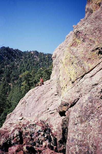 Chris Parks tries to get a ride up the Mohling Arete (5.5) on the back of this giant turtle wearing a beret. Photo by Tony Bubb, 9/06.