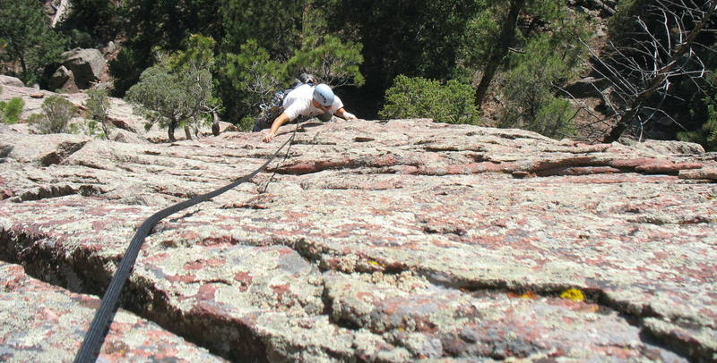 Mark Rucco follows the clean upper face of Seemed Like A Crack (5.8) on the Lost and Found Flatiron. Image by T. Bubb, 10/06.