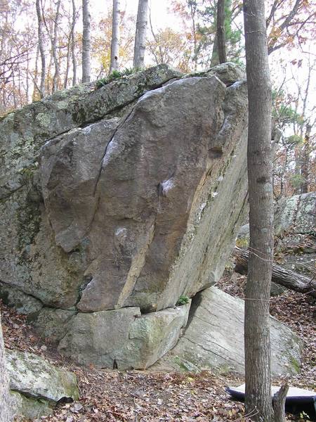 Only the Lonely climbs the golden obtuse arete with holds on both sides.