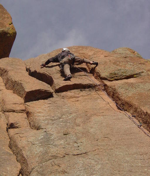 The direct finish. Gear was better than expected. Once stood up on the hump to my right, I used the arete on the right to make the final face moves. Plan B is to move left into a crack between this and Honky Jam Ass Crack.<br>
<br>
Photo by Paul Rezucha.
