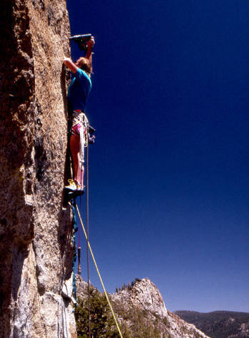 Al Swanson drilling on the first ascent of "Golden Shower".<br>
Photo by Blitzo.