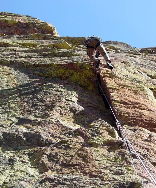 The first move above the ceiling is pretty easy. The next move is much harder.<br>
<br>
Photo by Paul Rezucha.