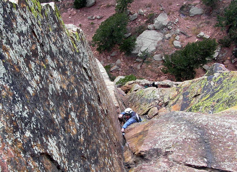 Mike Morley exiting the P4 traverse onto easier ground. Photo by John Fernandez.