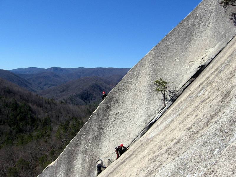 A pair of climbers move out on the next pitch of Great Arch, while another leader goes up Bombay Groove.