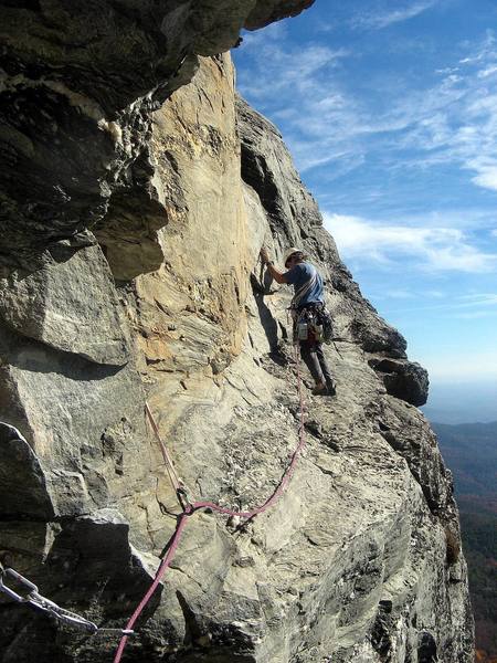 Having made the famous "move" on P2 of Peek-a-Boo, I now look for placements to protect my second on the traverse. Photo by Huong.