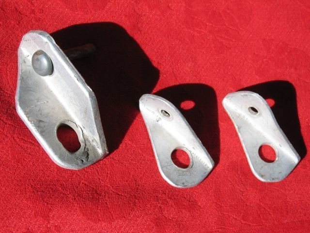 Homemade aluminum bolt hangers from Big Rock (Lake Perris, Ca). Note the elongation of the eyes on the hangers, particularly the oversized one on the left.
