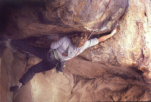 Reaching out for a pinky jam that is just around the lip. Photo by Mimi DeGravelle, 1985?
