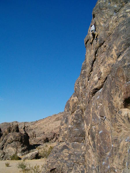 Fred near the top of Love Onsite (5.10c).