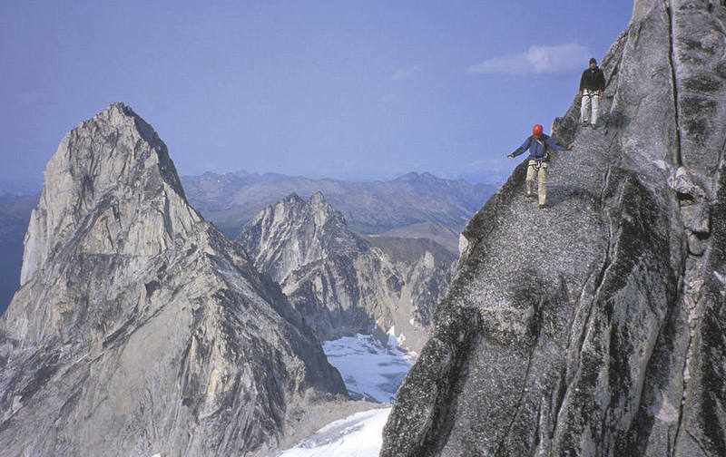 Lisa Foster and Paul Kejla on the descent with Bugaboo Spire on the left.