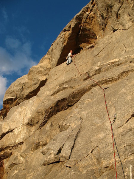 Isaac just below the crux on Goody Two Shoes (5.10b), Riverside Quarry.
