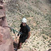 Tony At the last Belay of Desert Solitaire (5.11, III, Colorado National Monument). Photo by Bill Wright, 2005