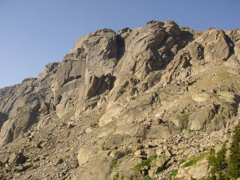 In the New Fork Valley on the NW side of the winds, near Dome Peak. Specimen Days 5.10 600' takes the left crack line on the clean face to the clean lower angled face at the top left skyline. FA - me, Ben Venter, Anna Haegel 7/06