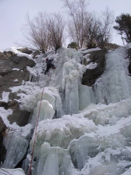 Climbing the leftmost route at Upper Falls Jan. 3, 2007. Lots of water, thin up top. Photo taken by Aaron Shileikis.