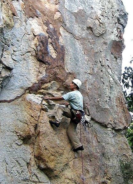 Working the crux on Misty.  Photo by Frank N.