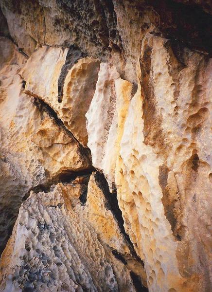 A close-up of some of the local rock in K.L. Malaysia. Sharp, textured, and pocketed limestone. Photo by Tony Bubb, 12/06.