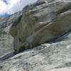 Me leading Northwest Books (5.6) in Tuolumne Meadows, Yosemite National Park (pic by Susan Holl)
