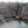 Little Railroad Quarry.  The broken walls on the left are A Wall, B Wall is at the end of the pond just right of center, and C Wall is on the right.