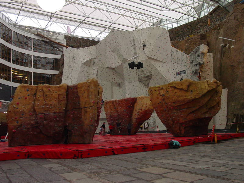 The recreational wall and cafe in the background with the 3 bouldering rocks in the foreground at Ratho, Edinburgh, Scotland