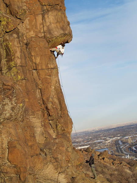 Tim Caldwell with the high heel, right before the roof crux.