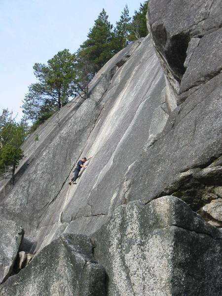 Peter Croft on Flying Circus.  We just happened to be there on a weekday when two veterans of Squamish climbing, Peter Croft and Hamish Fraser showed up, soloed all the good routes and left.