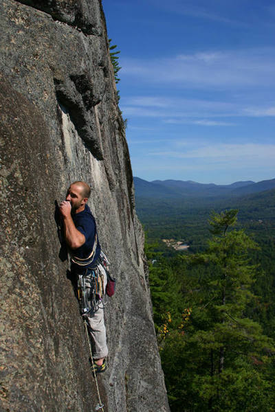 Jed climbing Layton's Ascent, with a view north in the background...