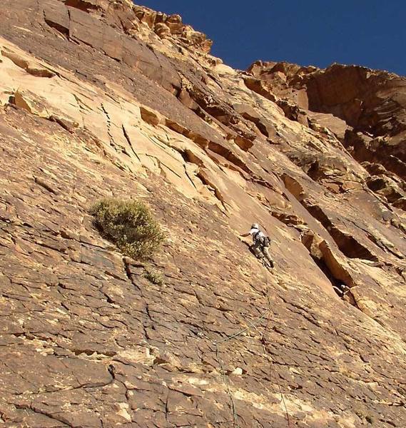 The beginning of Crocodile Rock. The first pitch ends in the broken white rock just above the climber.
