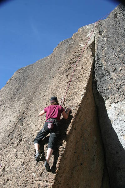 Julie passed the crux on Mandarin Orange.