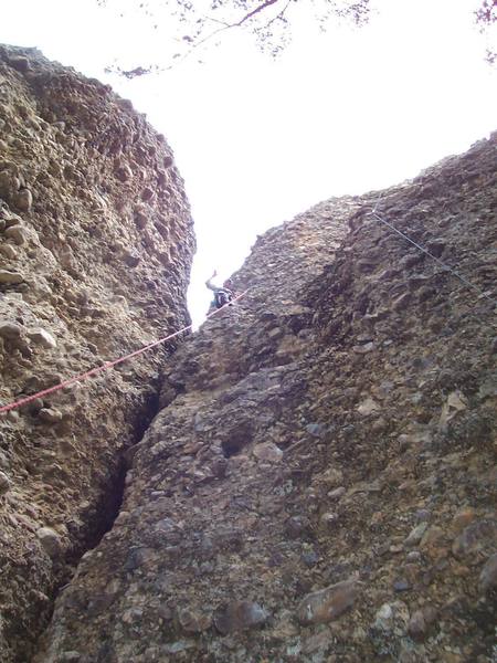 Humpty dumpty's chimney sweep service. Maple canyon. Crack/chimney to the left of climber<br>