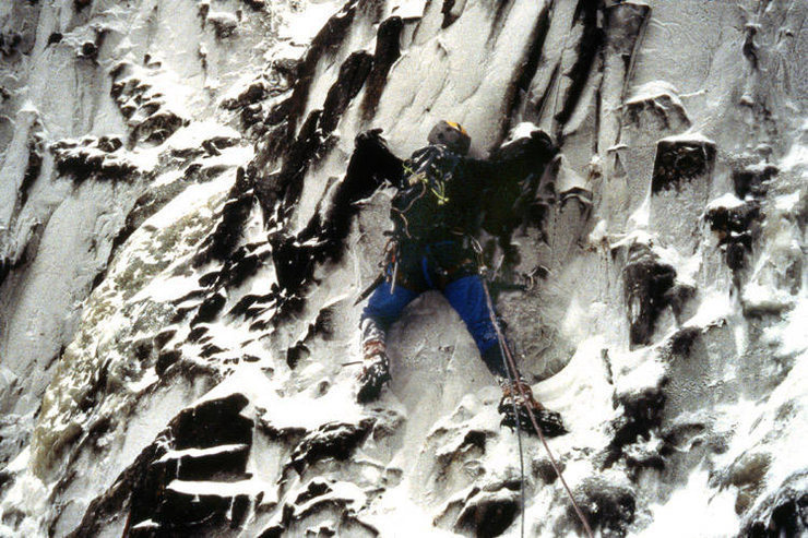 Traverse into crux at the beginning of the second pitch. Photo by Paul Crowder, 1989.