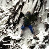 Traverse into crux at the beginning of the second pitch.  Photo by Paul Crowder, 1989.