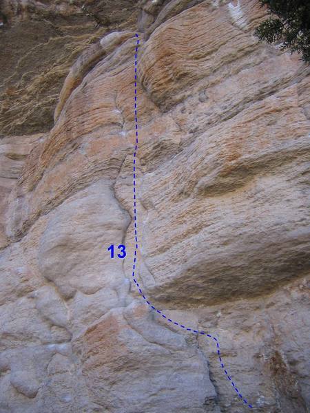 Pillar of Pummel follows the obvious parallel crack features below the large roof.